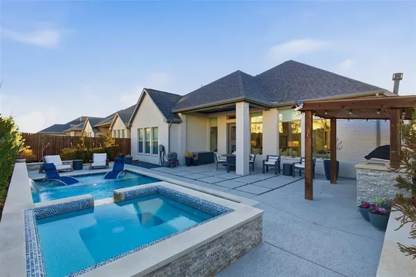 a view of house with outdoor seating space
