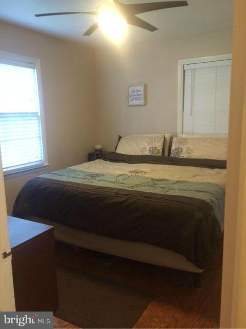 403 Buffalo Road Mount Airy, MD 21771 - Photo 11 of 14 a bedroom with a bed and a window