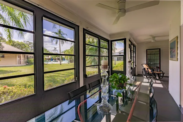 a very nice looking room with furniture and windows