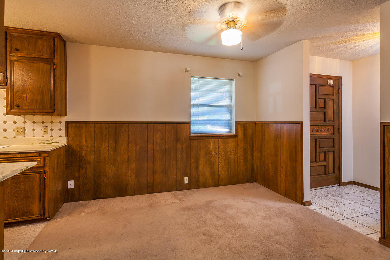 7002 Euclid Street Amarillo, TX 79110 - Photo 5 of 23 a view of a livingroom with a kitchen