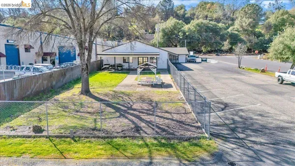 a view of a livingroom with furniture and a garage