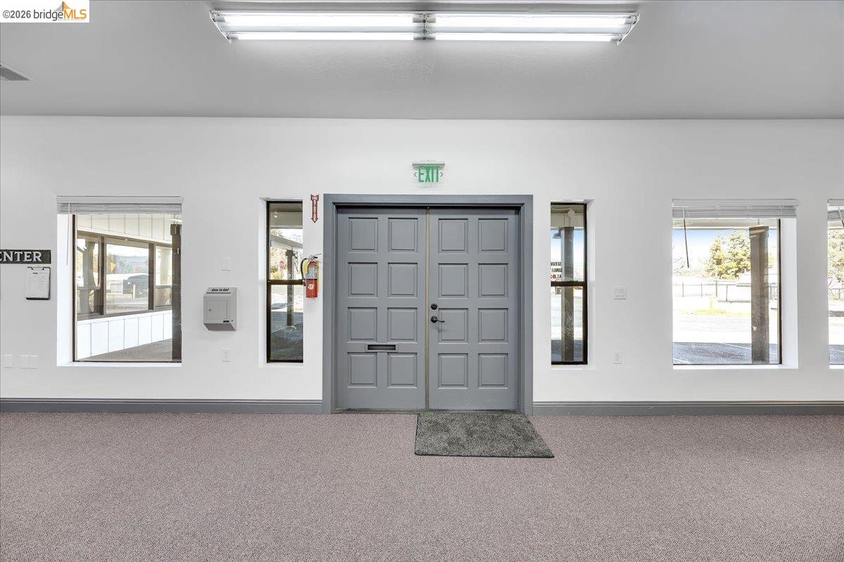 14326 Tuolumne Road Sonora, CA 95370 - Photo 17 of 48 a view of an empty room with window and cabinet