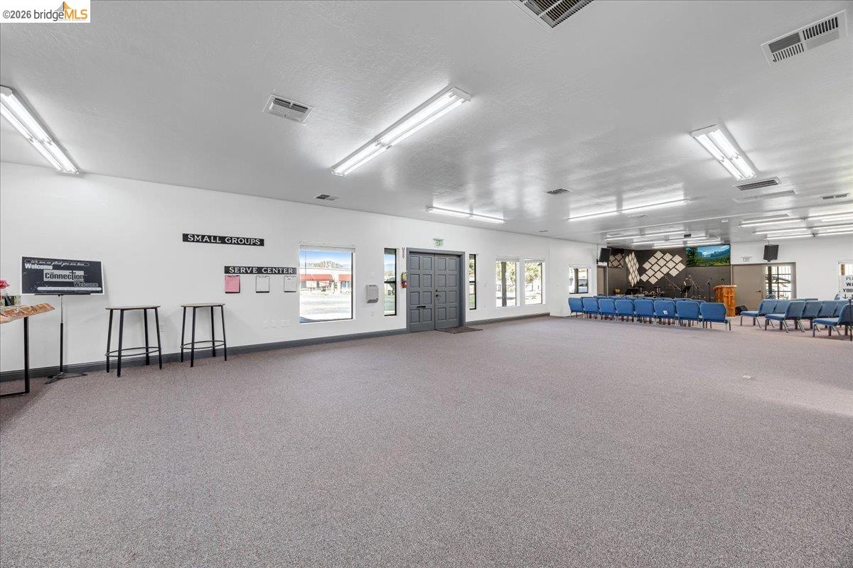 14326 Tuolumne Road Sonora, CA 95370 - Photo 19 of 48 a view of a livingroom with furniture and a garage