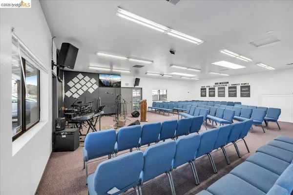 a kitchen with stainless steel appliances a sink and a refrigerator