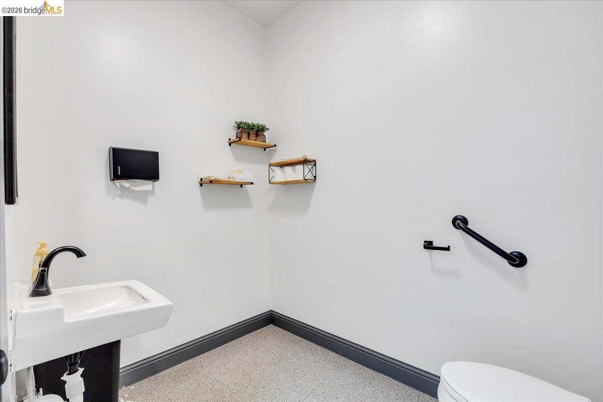 14326 Tuolumne Road Sonora, CA 95370 - Photo 32 of 48 a bathroom with a sink and a toilet