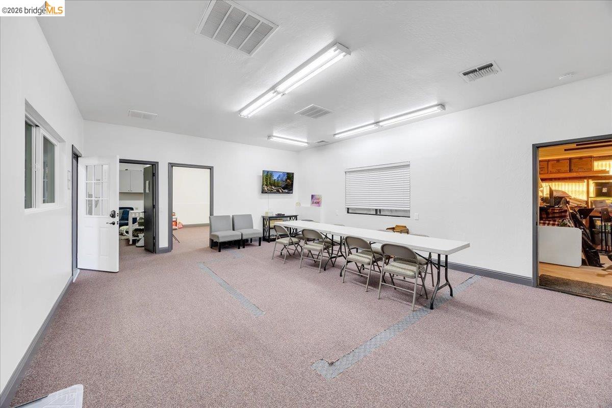 14326 Tuolumne Road Sonora, CA 95370 - Photo 37 of 48 a living room with furniture and a window