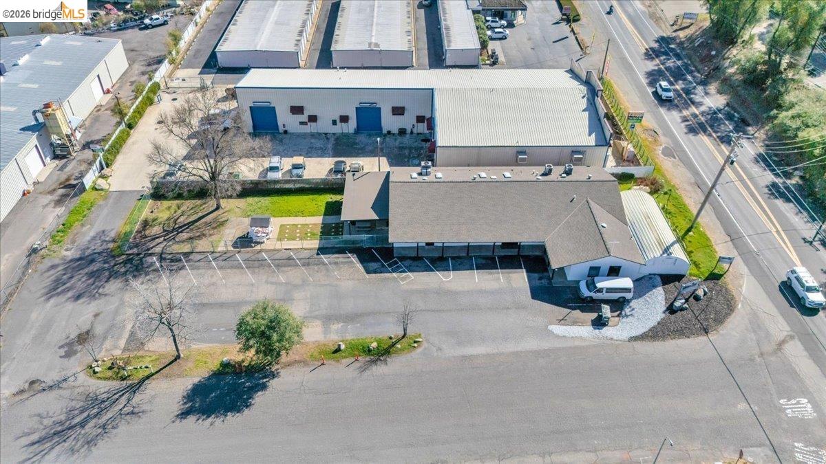 14326 Tuolumne Road Sonora, CA 95370 - Photo 9 of 48 an aerial view of a house with swimming pool and sitting area