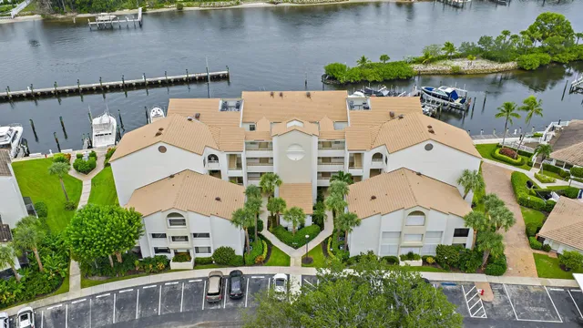 an aerial view of multiple houses with outdoor space