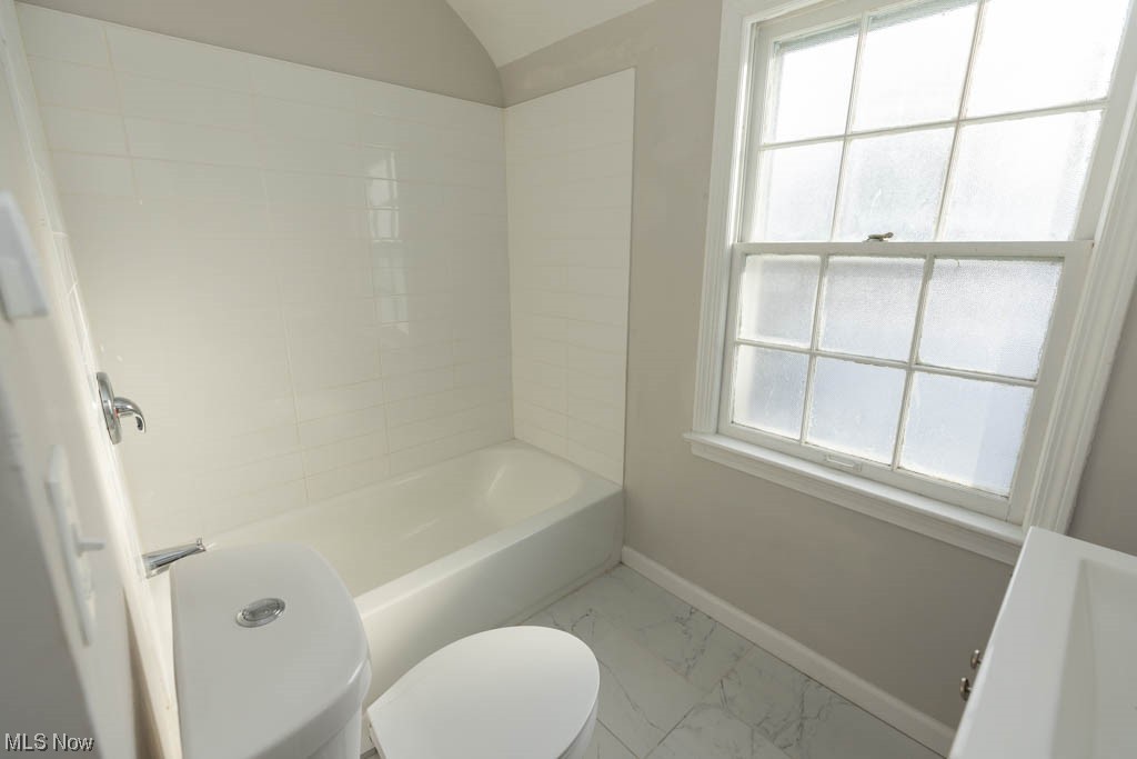 3890 Wallingford Road South Euclid, OH 44121 - Photo 14 of 19 Full bathroom with sink, toilet, tiled shower / bath combo, and tile flooring