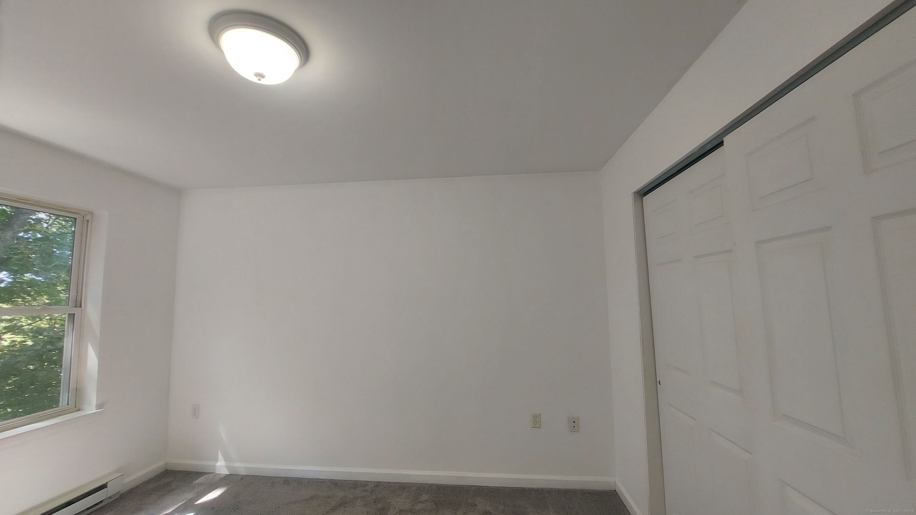 10 Hillcrest Street, Unit B Norwich, CT 06360 - Photo 24 of 34 a view of an empty room with a window