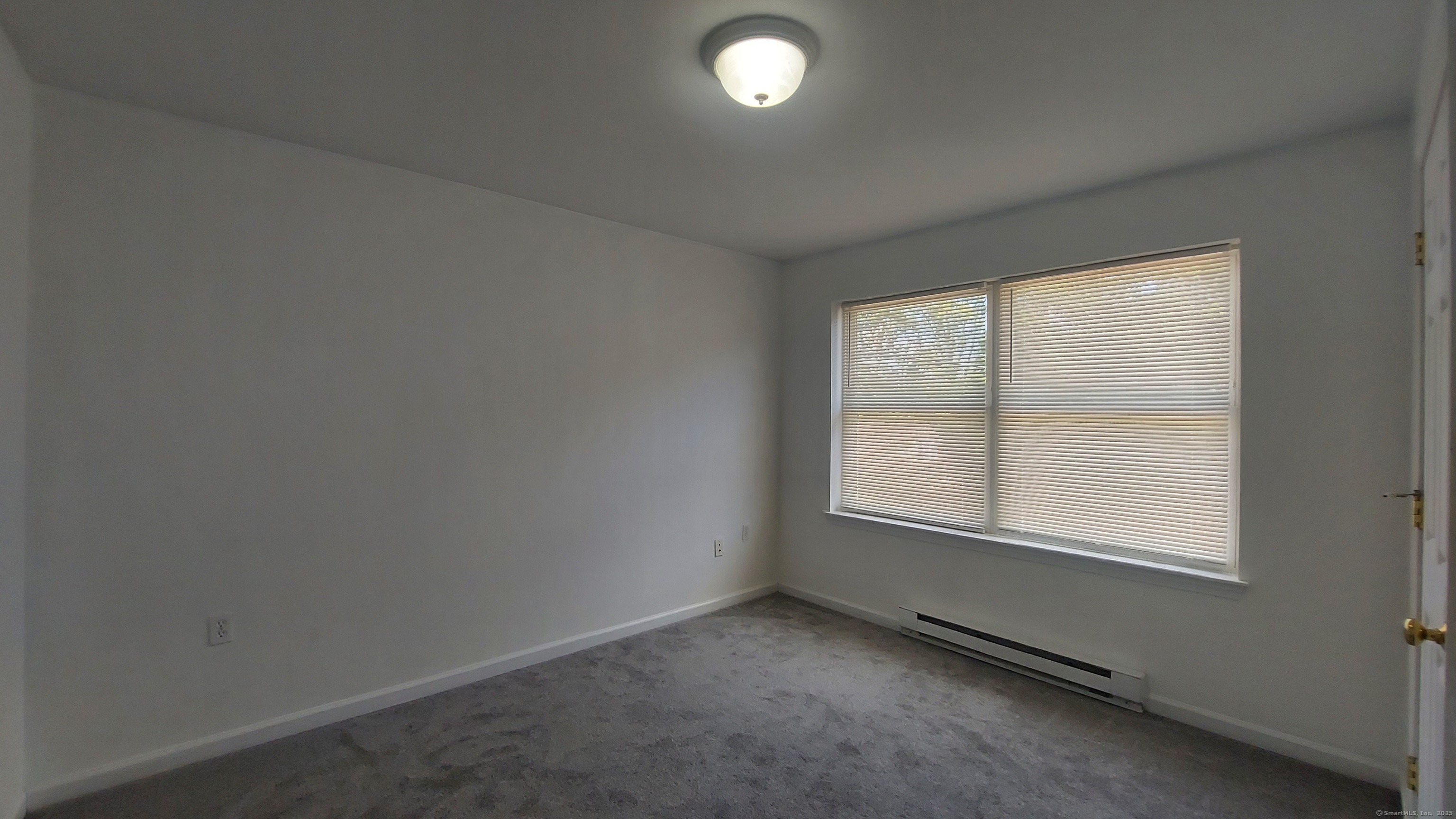 10 Hillcrest Street, Unit B Norwich, CT 06360 - Photo 26 of 34 an empty room with a window