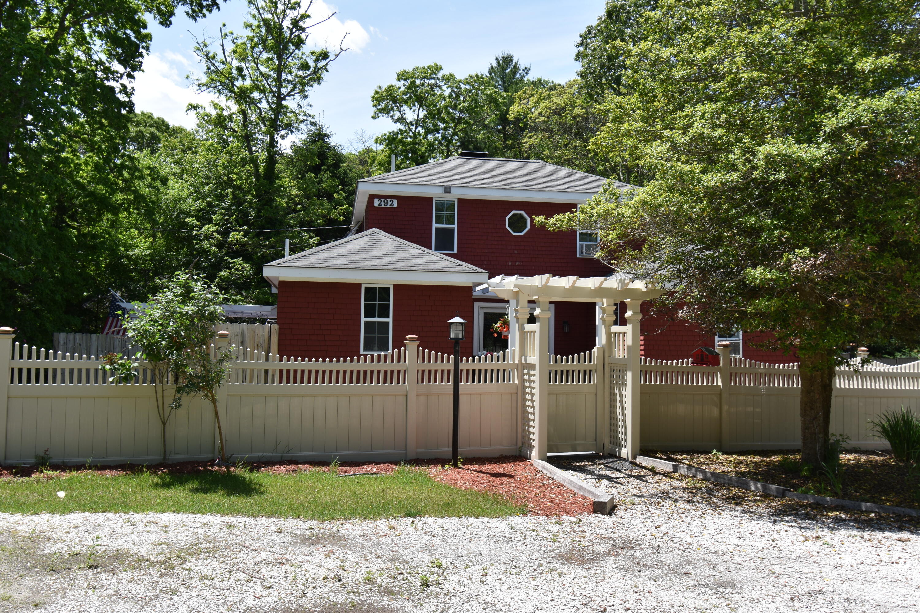 292 Old Mill Road Marstons Mills, MA 02648 - Photo 1 of 39 a front view of a house with a yard