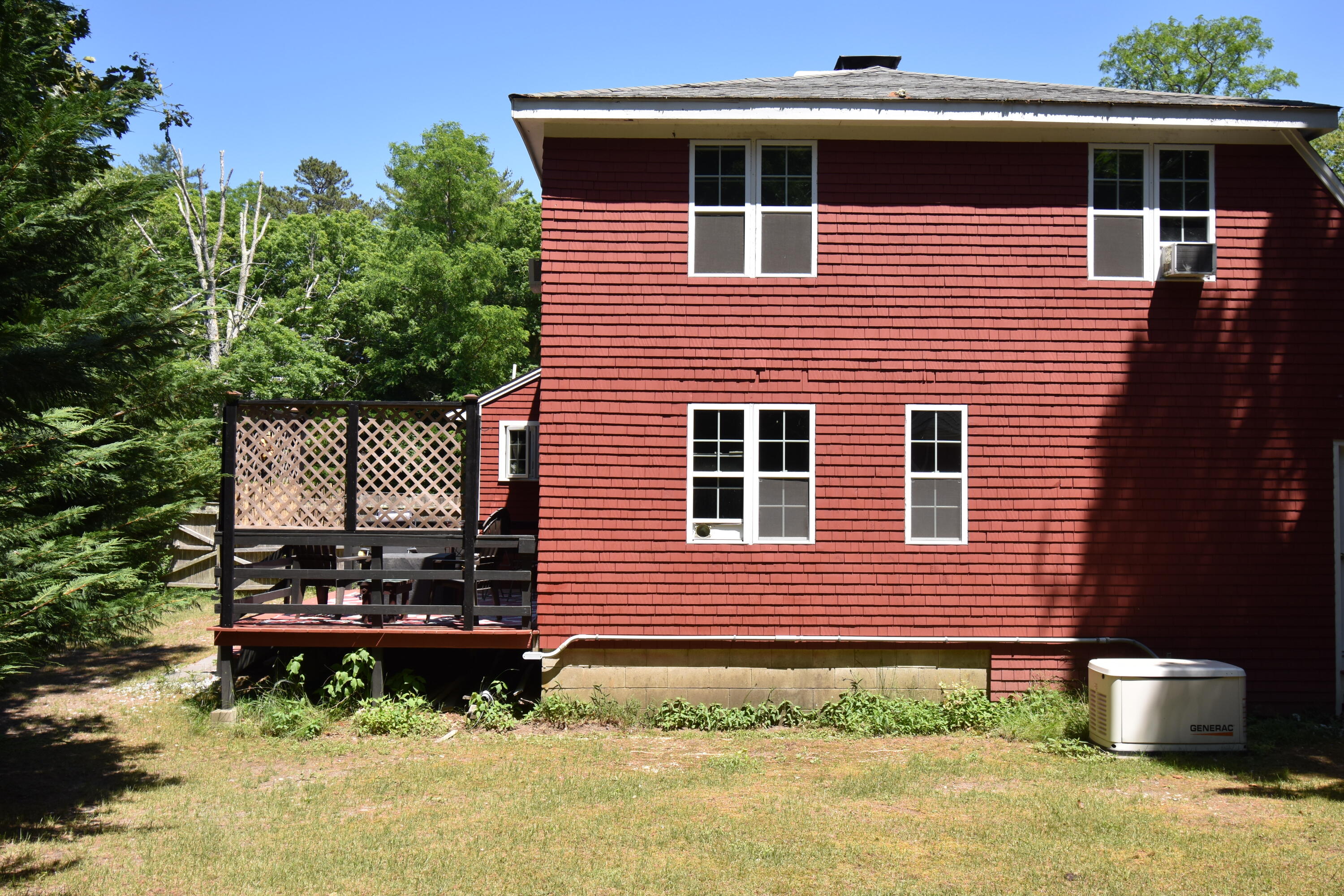 292 Old Mill Road Marstons Mills, MA 02648 - Photo 13 of 39 a front view of a house with a yard