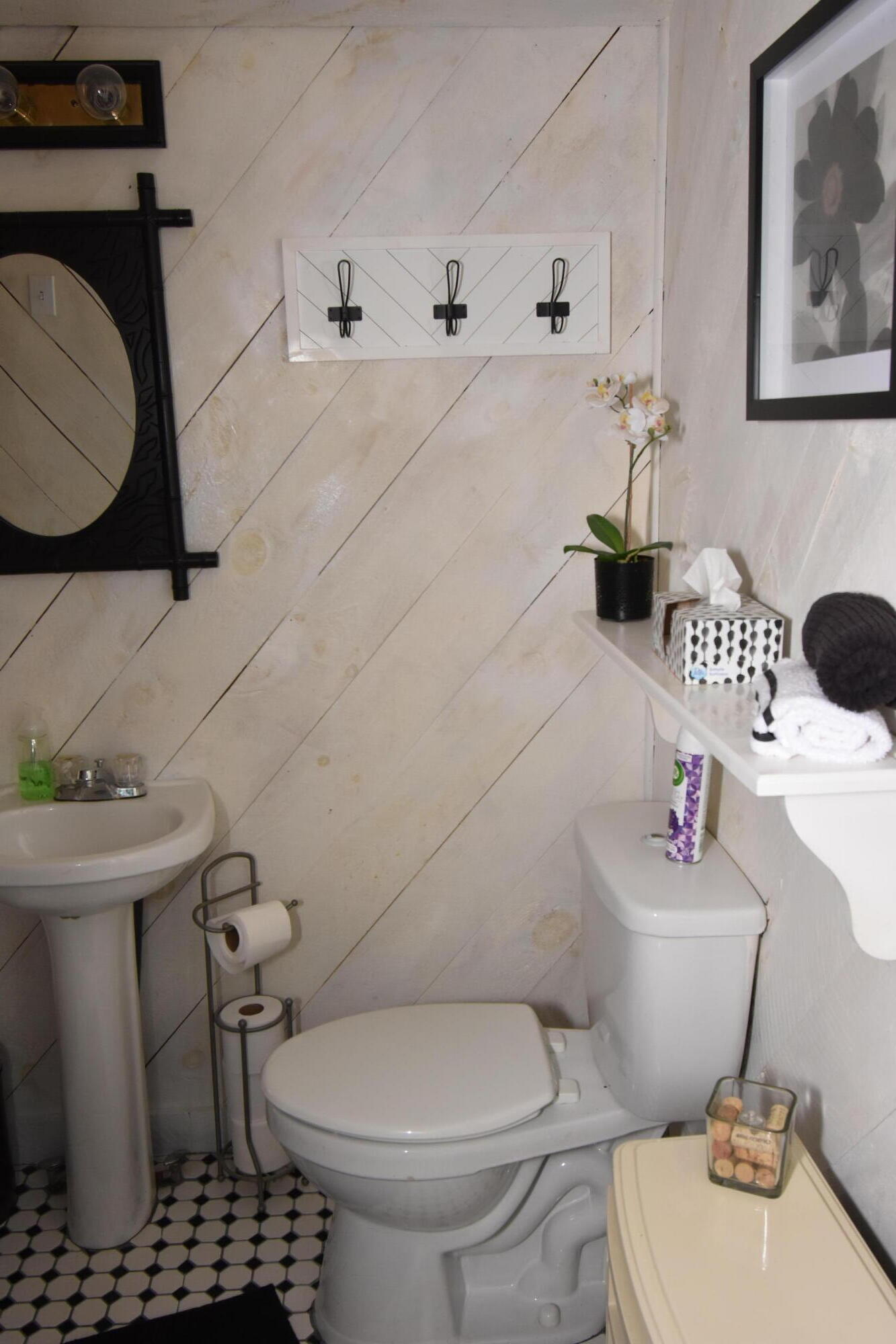 292 Old Mill Road Marstons Mills, MA 02648 - Photo 22 of 39 a white toilet sitting next to a bathroom sink