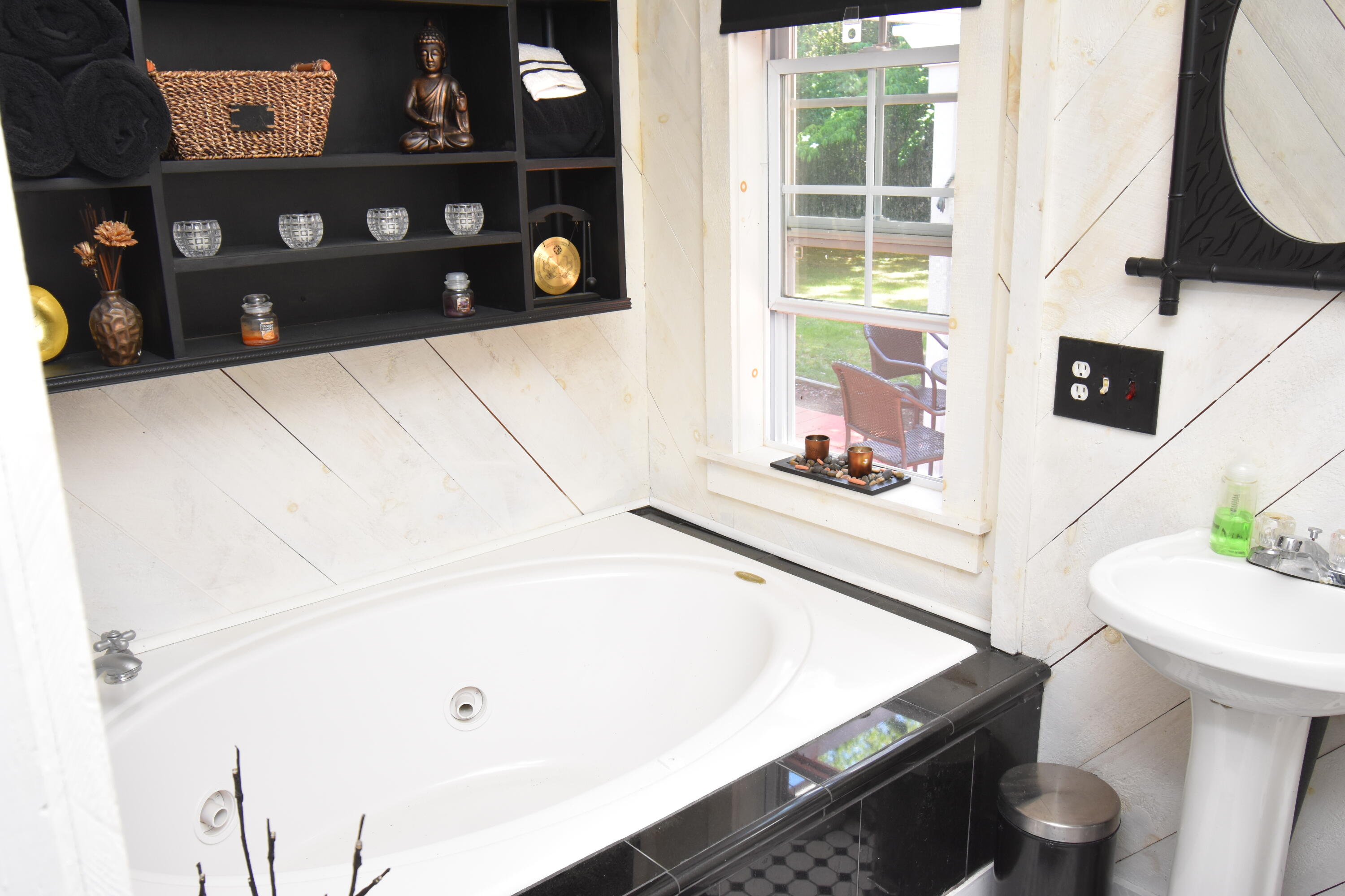 292 Old Mill Road Marstons Mills, MA 02648 - Photo 23 of 39 a bathroom with a bathtub and a sink