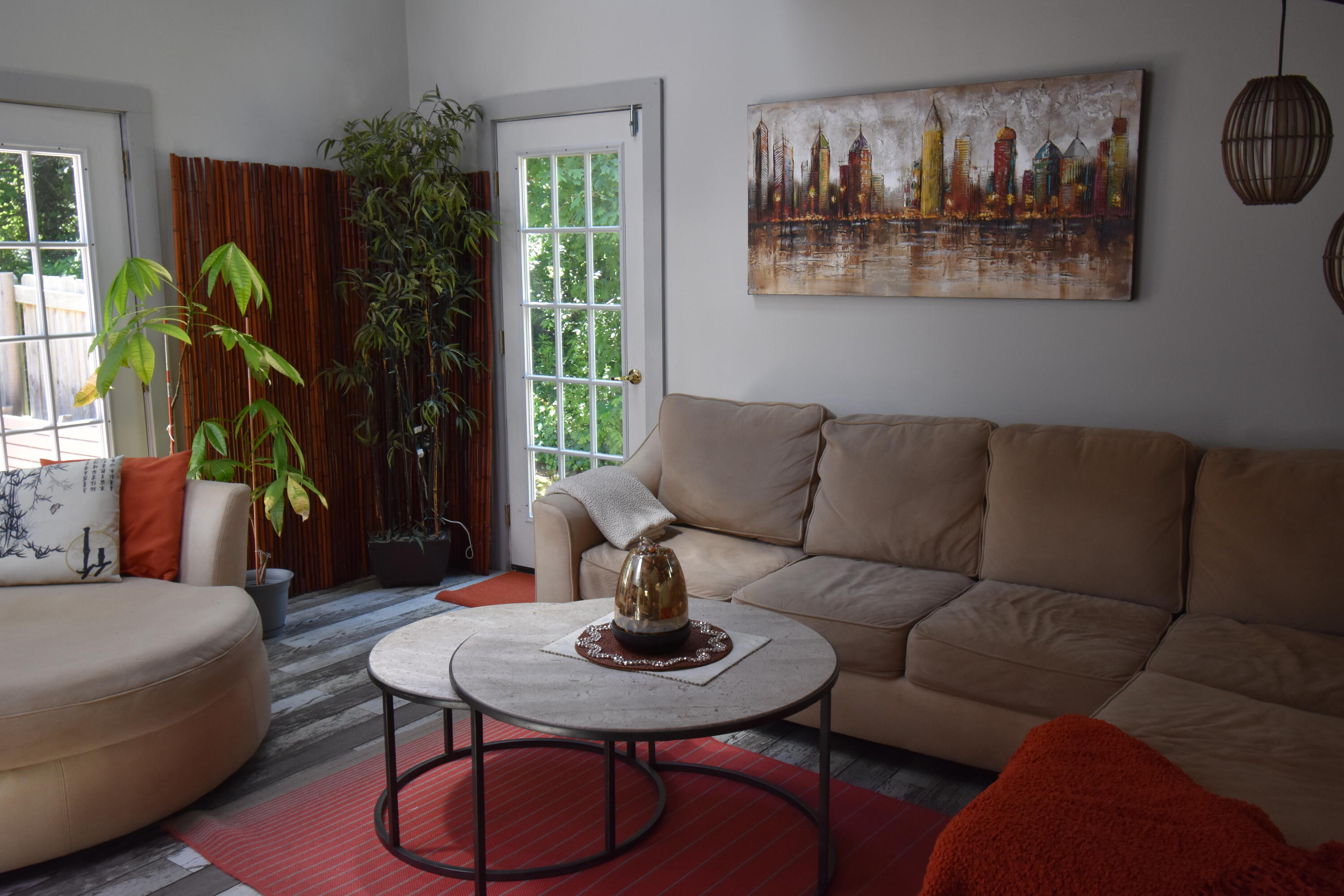 292 Old Mill Road Marstons Mills, MA 02648 - Photo 24 of 39 a living room with furniture and a potted plant