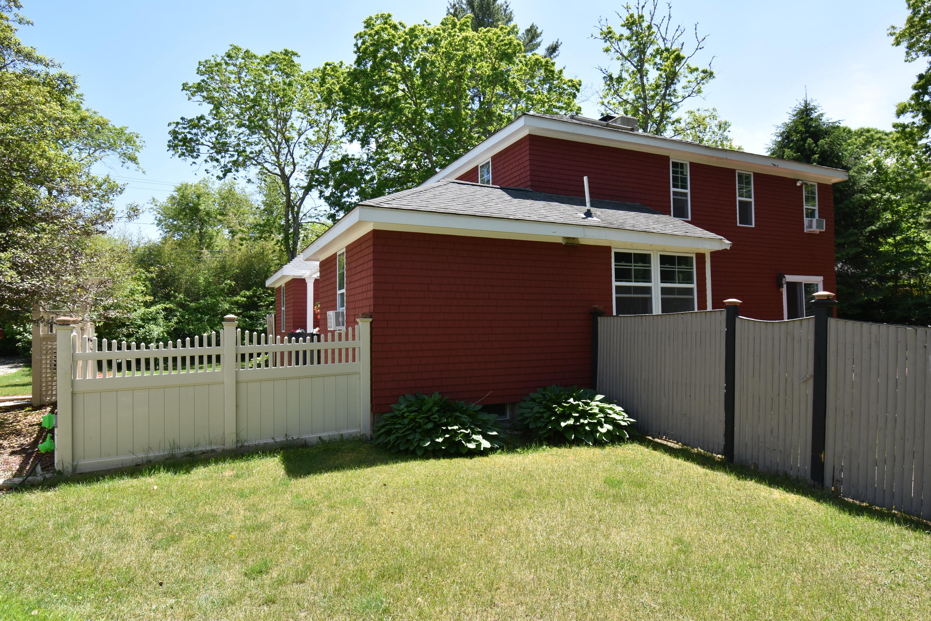 292 Old Mill Road Marstons Mills, MA 02648 - Photo 4 of 39 a front view of a house with a yard
