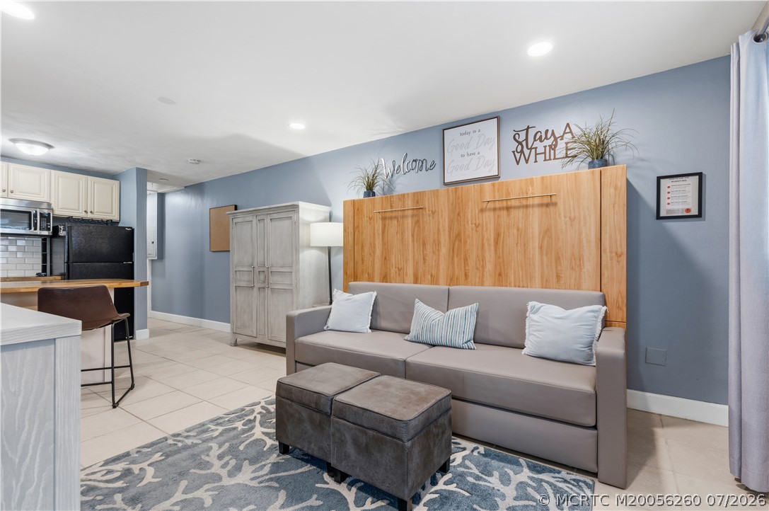 657 Southwest Cleveland Avenue Stuart, FL 34994 - Photo 5 of 34 Unit A Murphy Bed/Family Room