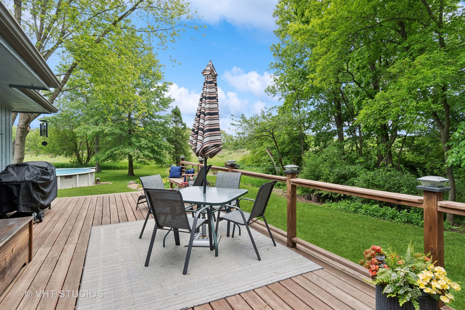 62 Foxhurst Lane Newark, IL 60541 - Photo 29 of 36 a view of a chairs and table on the wooden deck