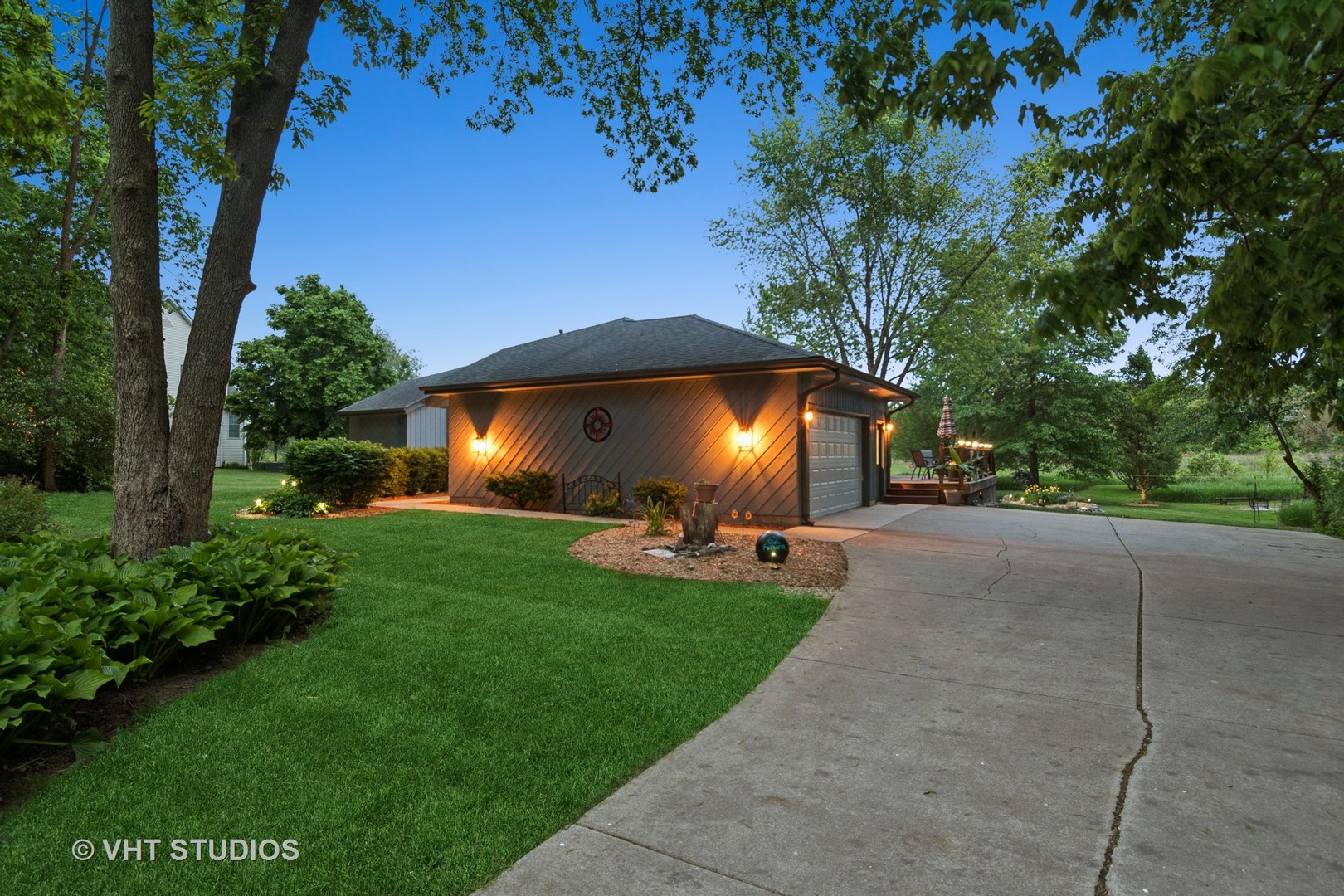62 Foxhurst Lane Newark, IL 60541 - Photo 6 of 36 a view of a backyard with a garden and entertaining space