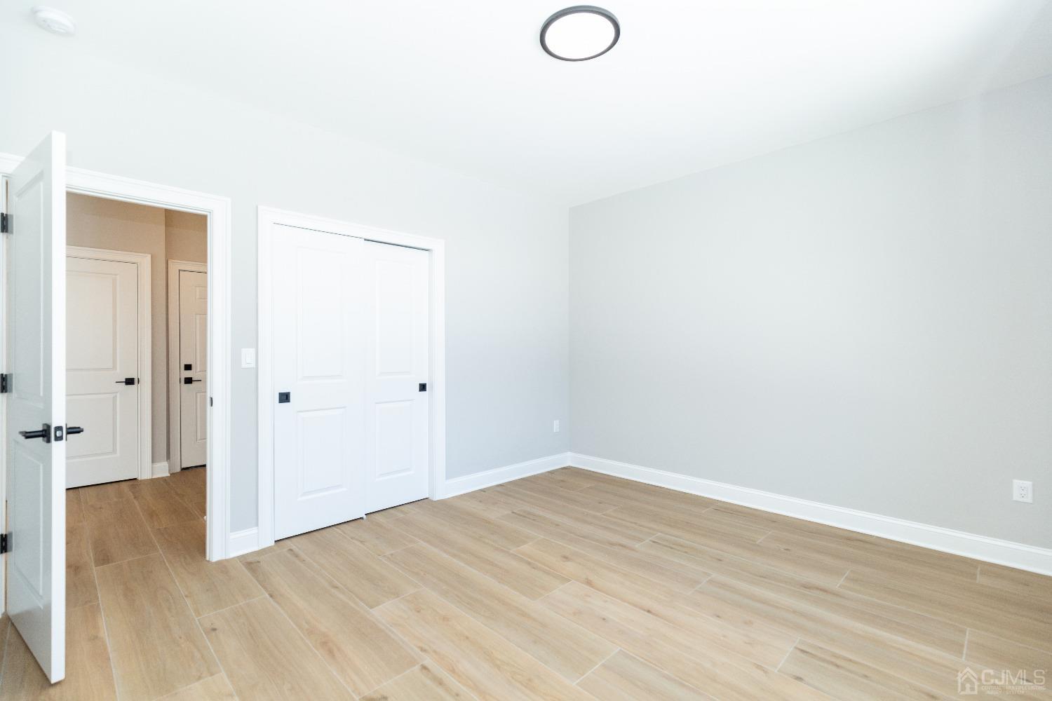 60 Brookville Road Edison, NJ 08817 - Photo 22 of 56 a view of a room with wooden floor
