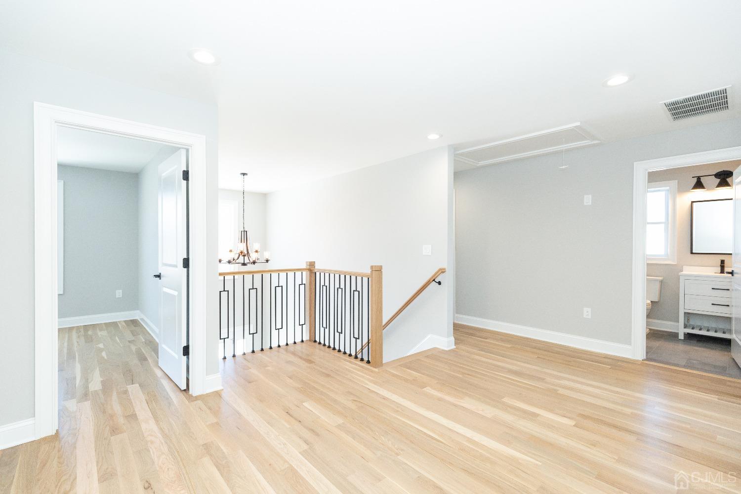 60 Brookville Road Edison, NJ 08817 - Photo 27 of 56 a view of a livingroom with wooden floor and entryway
