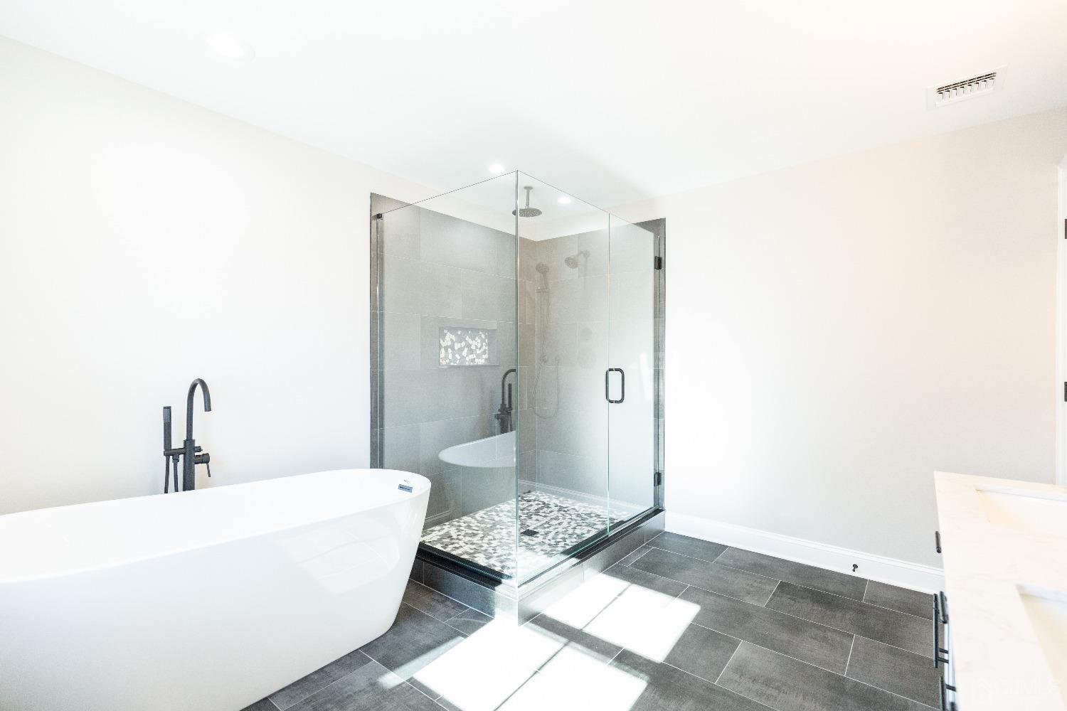 60 Brookville Road Edison, NJ 08817 - Photo 33 of 56 a bathroom with a sink a toilet and shower