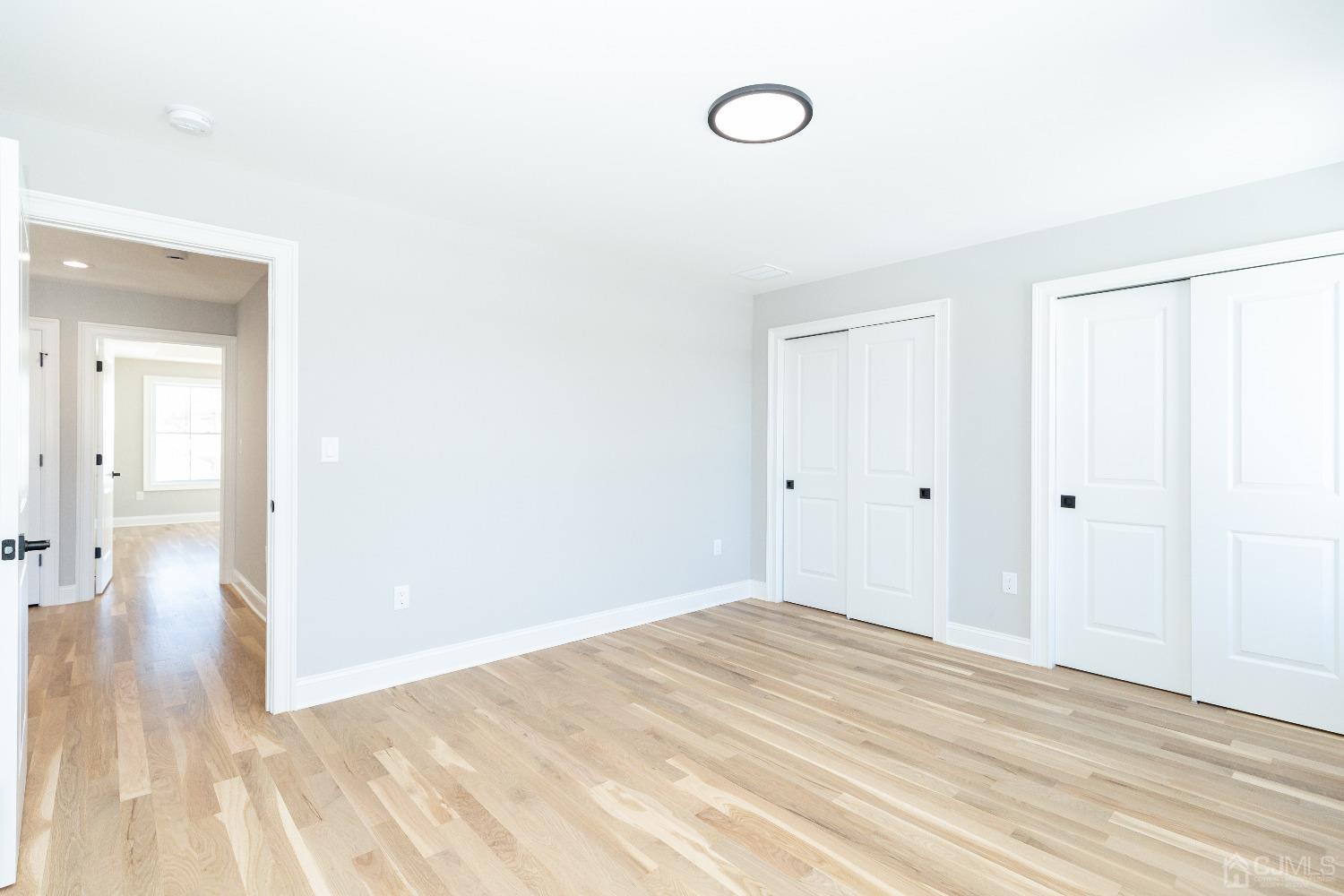 60 Brookville Road Edison, NJ 08817 - Photo 38 of 56 a view of a room with wooden floor and bathroom