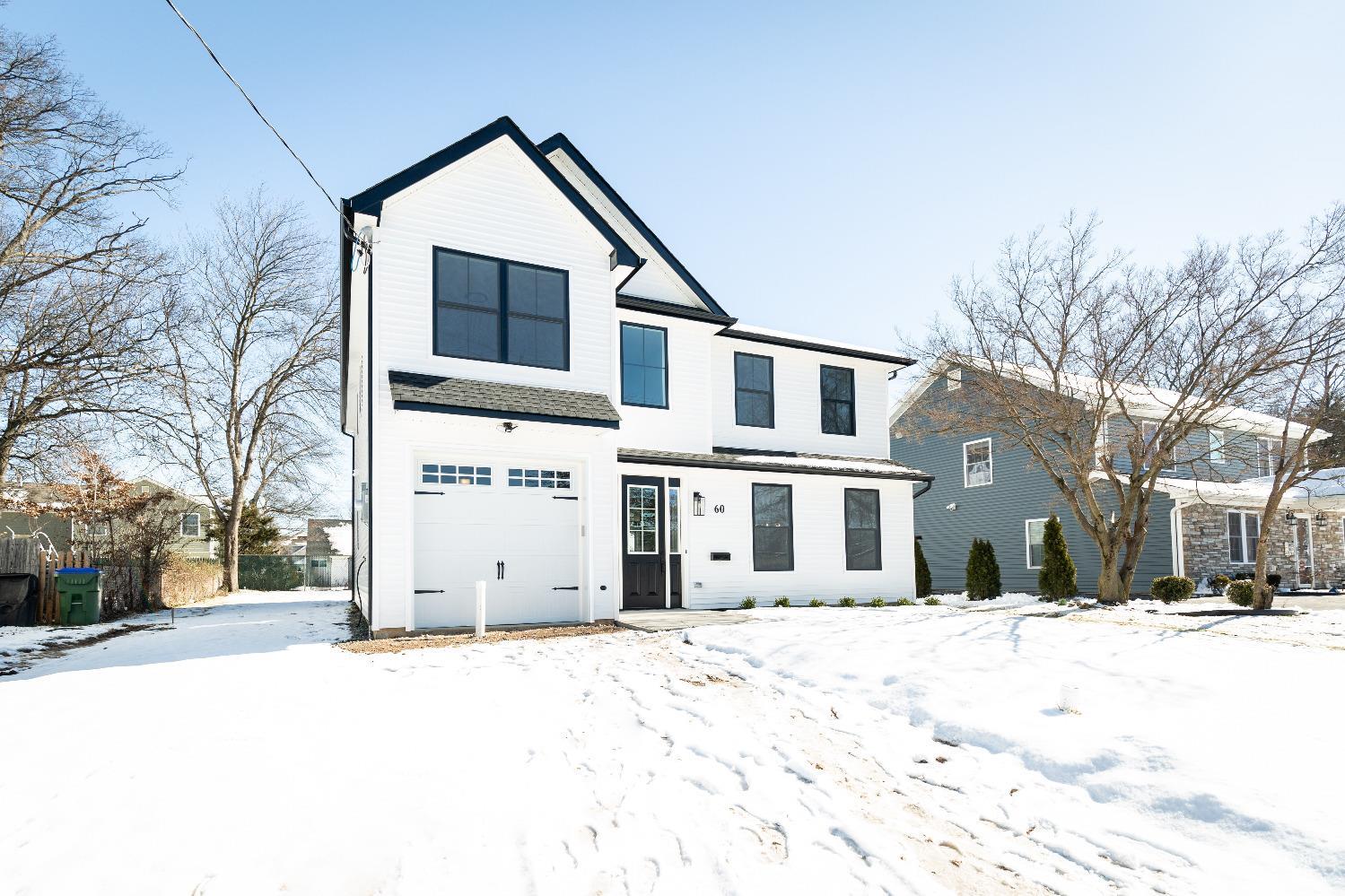 60 Brookville Road Edison, NJ 08817 - Photo 4 of 56 a front view of a house with a yard