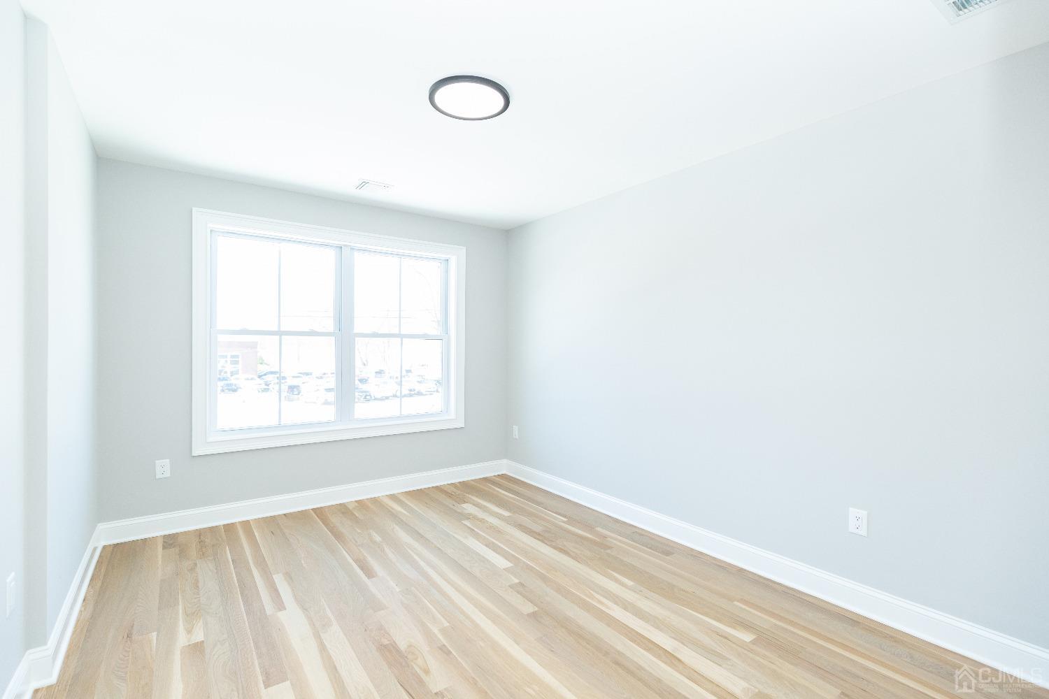 60 Brookville Road Edison, NJ 08817 - Photo 43 of 56 an empty room with a window