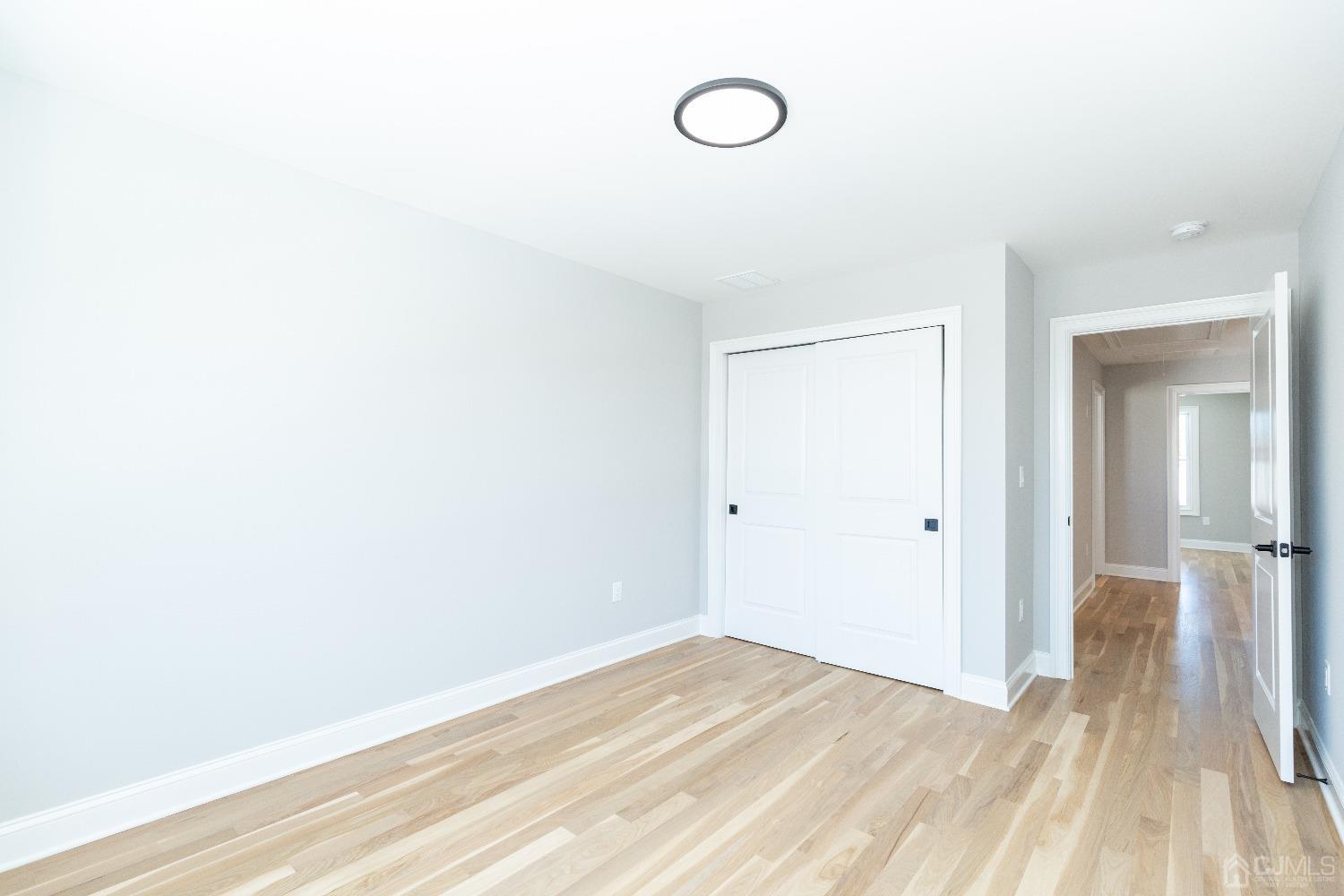60 Brookville Road Edison, NJ 08817 - Photo 44 of 56 a view of a room with wooden floor and bathroom sink
