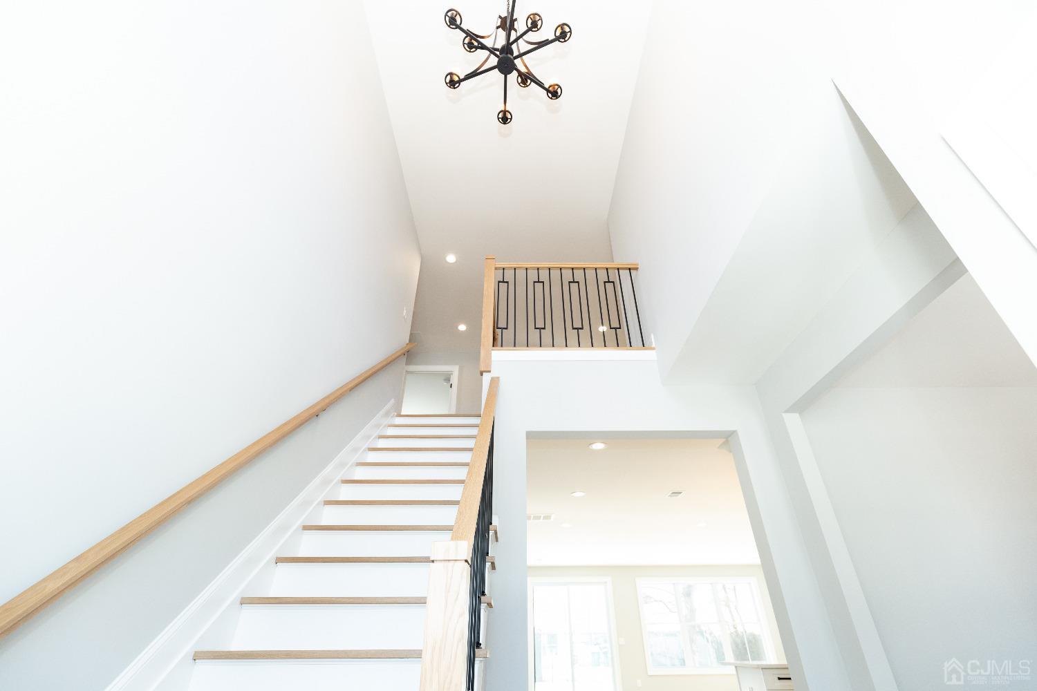 60 Brookville Road Edison, NJ 08817 - Photo 6 of 56 a view of a hallway with wooden floor and entryway