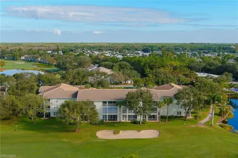 a view of a city with a building in the background