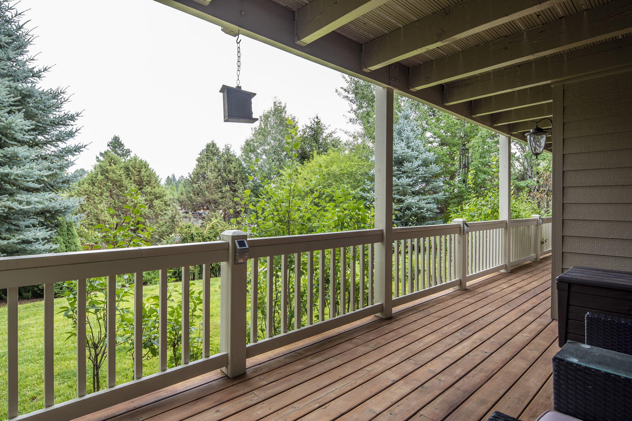 61538 Southeast Hill Ridge Road Bend, OR 97702 - Photo 48 of 59 a view of a balcony with wooden floor