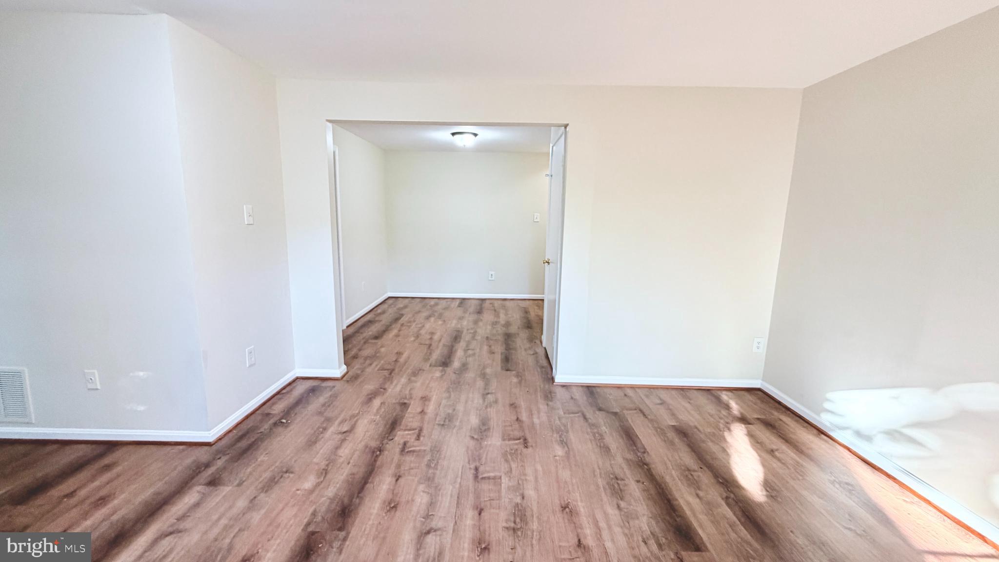 122 Sharpstead Lane Gaithersburg, MD 20878 - Photo 23 of 43 a view of a room with wooden floor and a bathroom