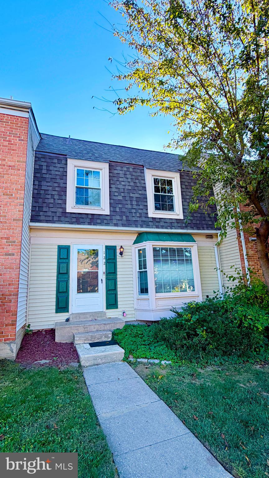 122 Sharpstead Lane Gaithersburg, MD 20878 - Photo 26 of 43 a front view of a house with a yard and porch