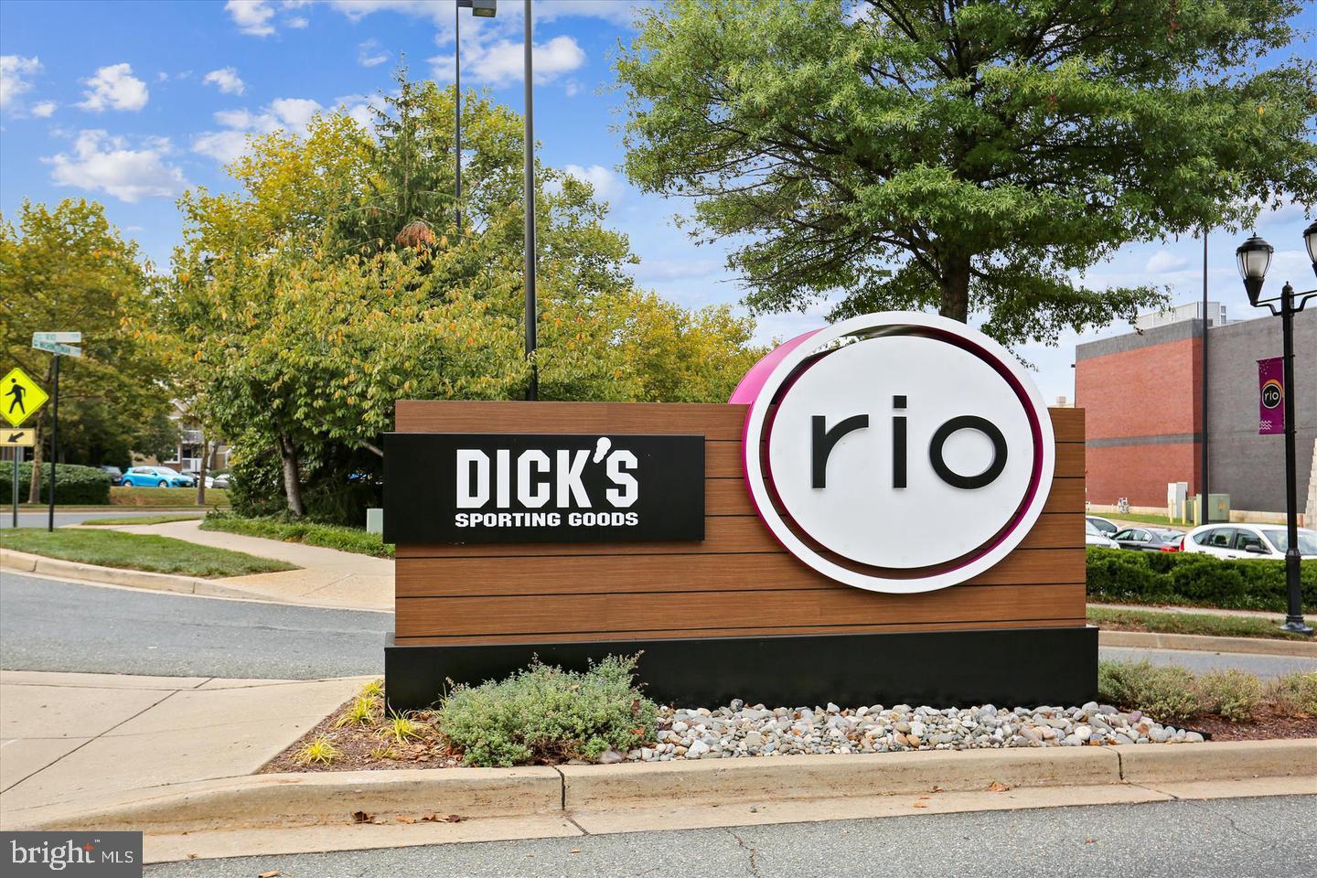 122 Sharpstead Lane Gaithersburg, MD 20878 - Photo 39 of 43 a view of sign board with flower plants