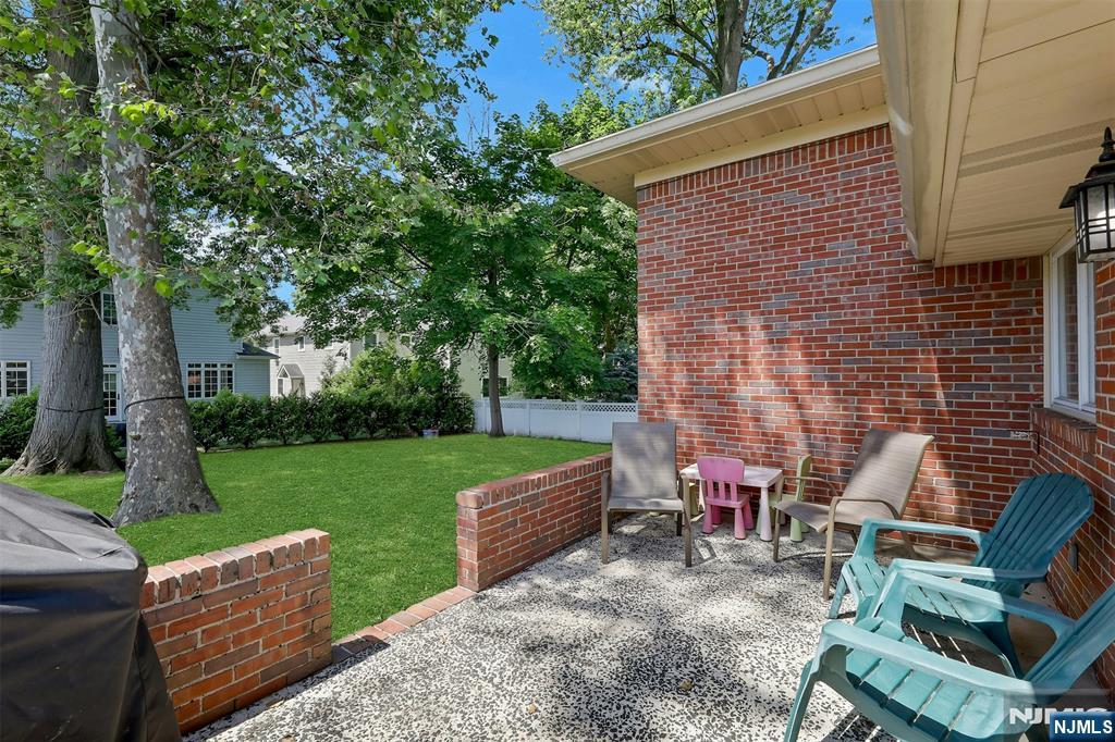 514 Rutland Avenue Teaneck, NJ 07666 - Photo 31 of 40 a view of backyard with seating space and garden