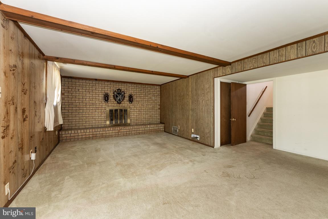 3902 Klausmier Road Nottingham, MD 21236 - Photo 18 of 25 downstairs sitting area w/fireplace