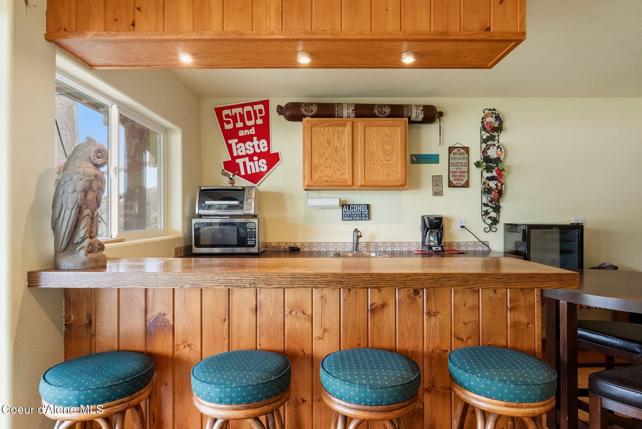 36 Gosling Point Priest River, ID 83856 - Photo 31 of 71 Cozy up to the bar