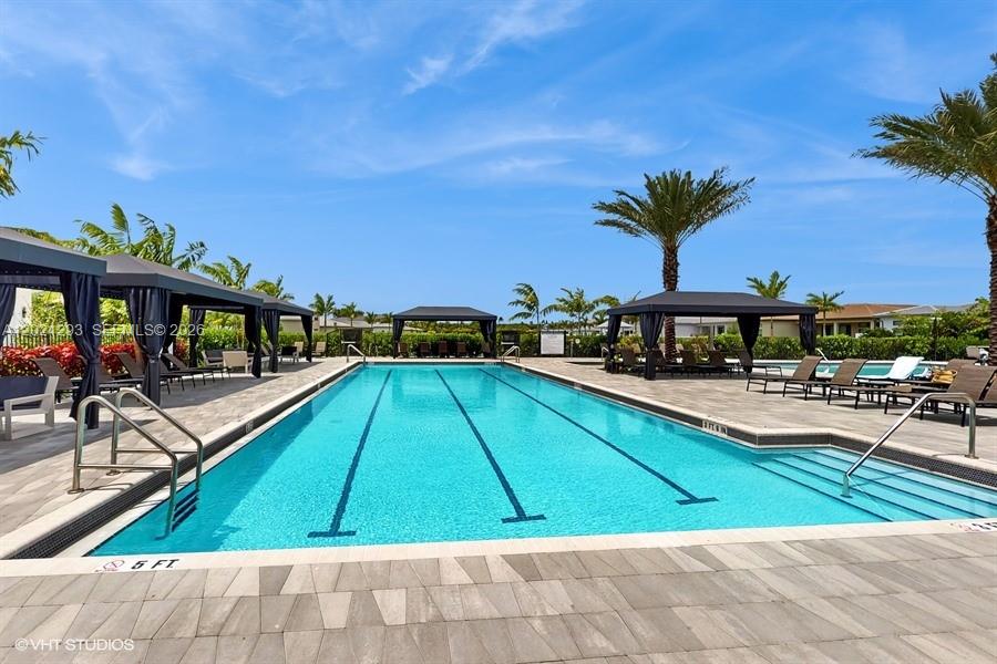 8350 Royal County Down Road Boca Raton, FL 33434 - Photo 43 of 52 a view of swimming pool with chairs