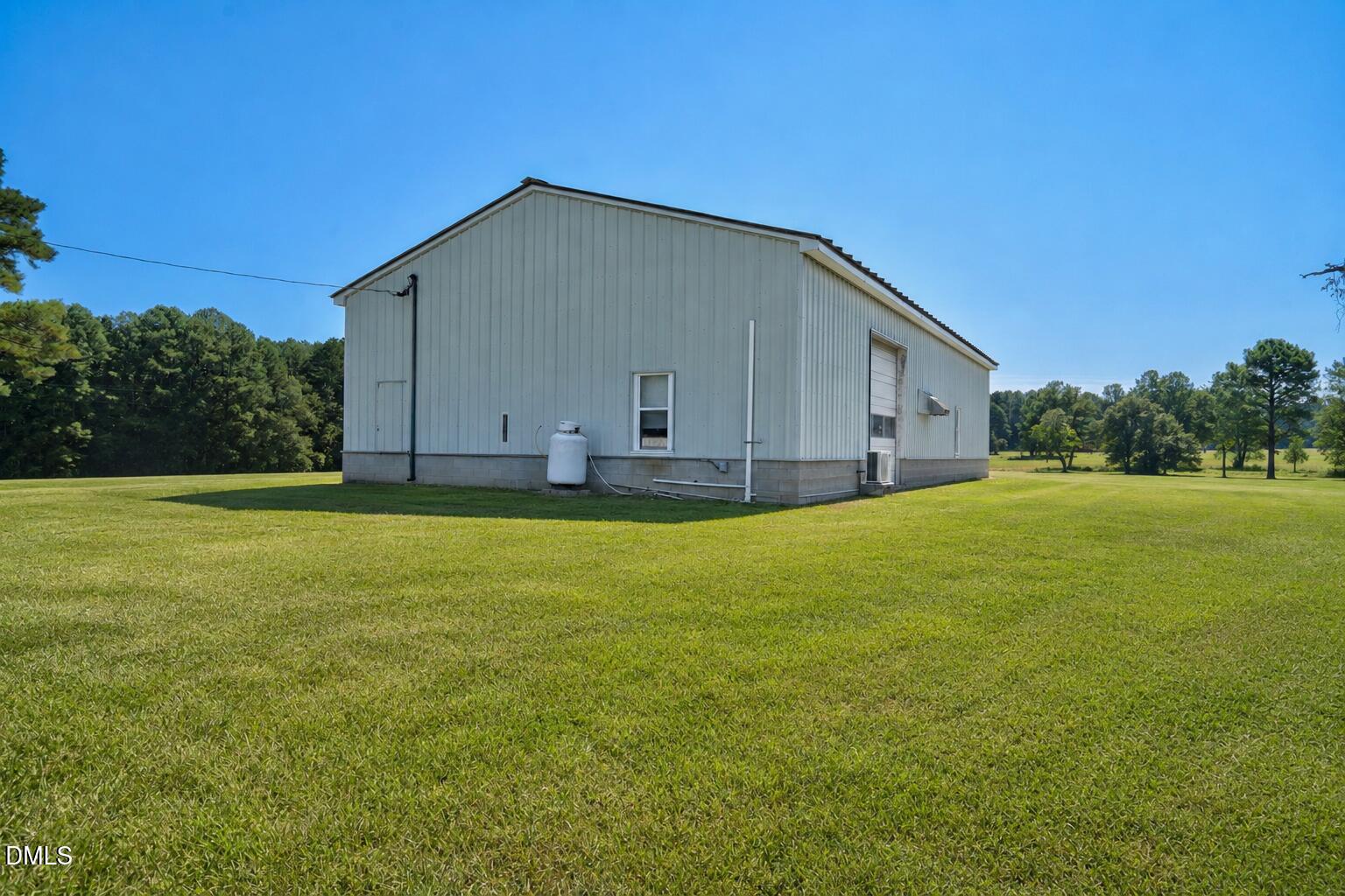6515 Tonya Road Elm City, NC 27822 - Photo 29 of 52 a view of a house with a yard