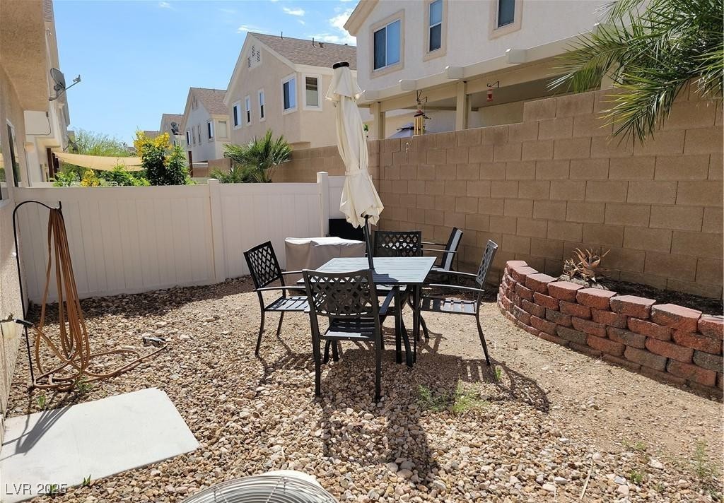 8707 Roping Rodeo Avenue, Unit 102 Las Vegas, NV 89178 - Photo 12 of 16 Backyard