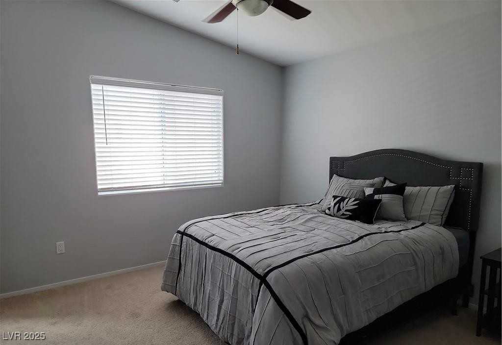 8707 Roping Rodeo Avenue, Unit 102 Las Vegas, NV 89178 - Photo 7 of 16 Primary bedroom