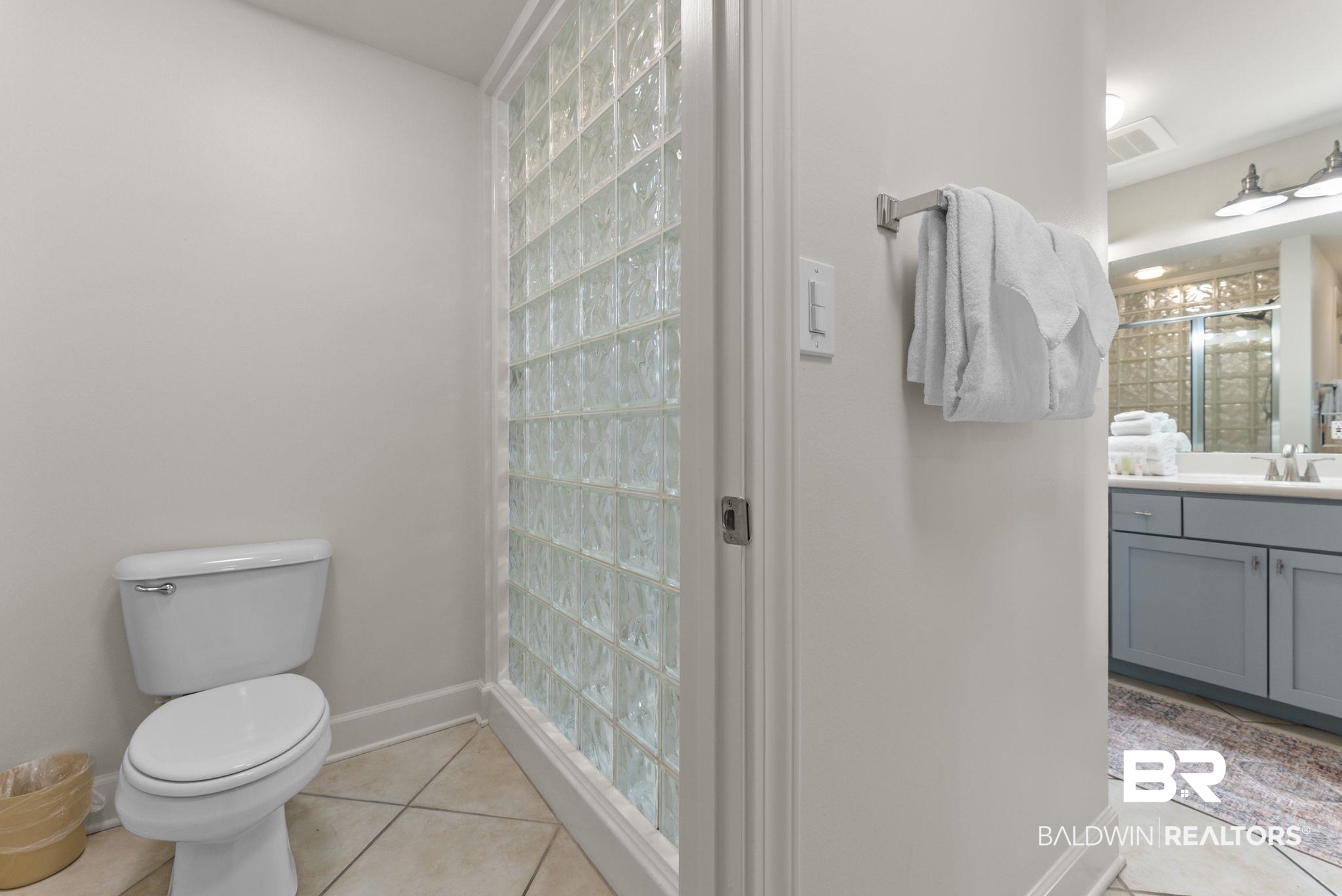 27580 Canal Road, Unit 1233 Orange Beach, AL 36561 - Photo 17 of 79 Bathroom featuring vanity and light tile patterned flooring