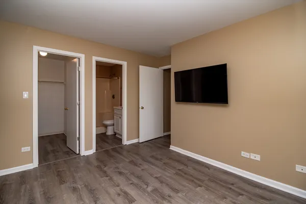 a view of a livingroom with wooden floor