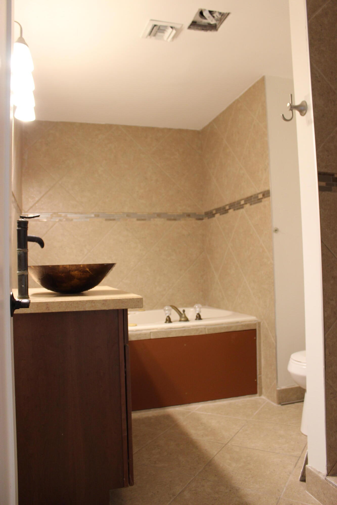4253 Southeast Seaward Street, Unit 2 Stuart, FL 34997 - Photo 11 of 17 Guest Bath