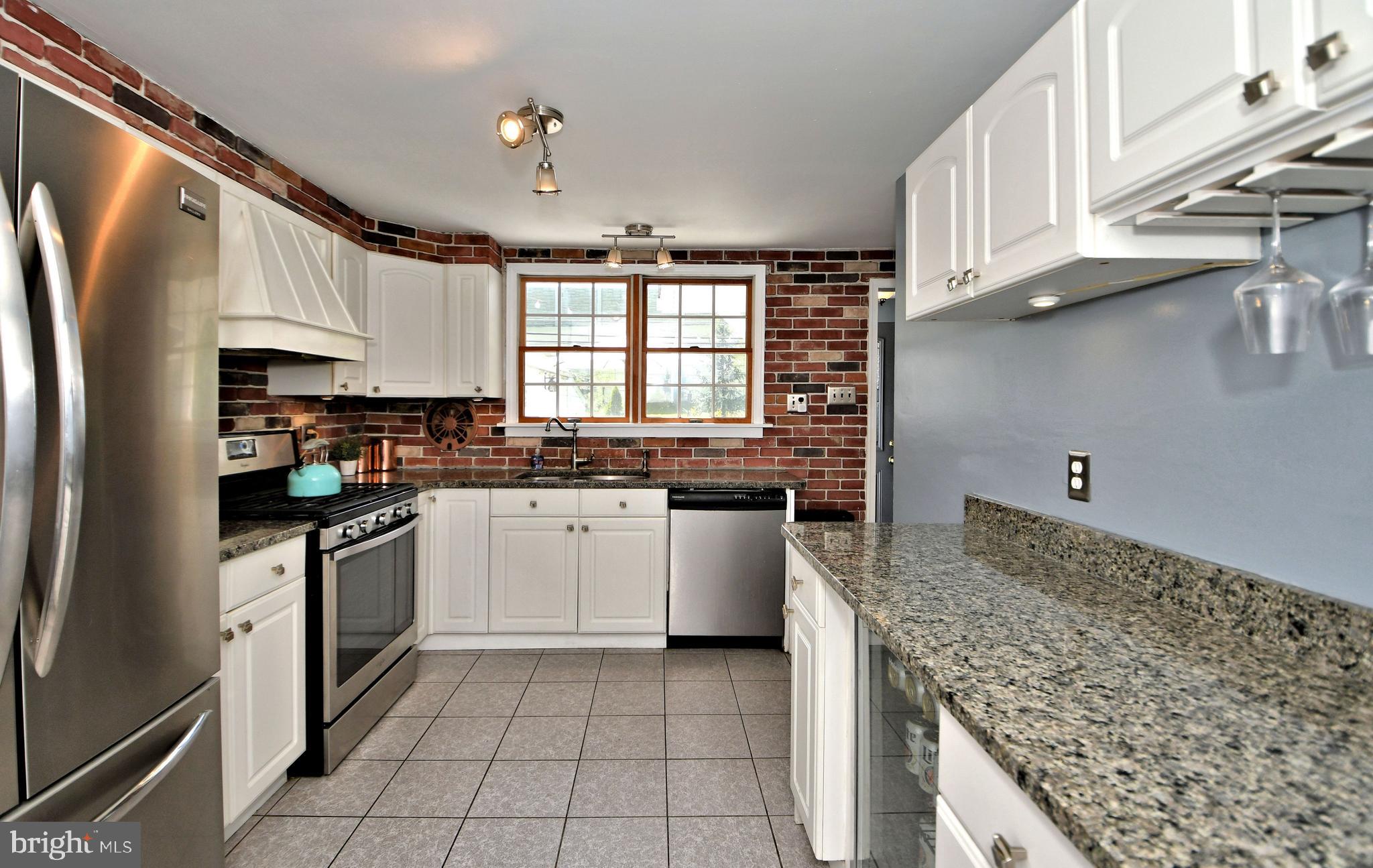 1900 Scott Road Oreland, PA 19075 - Photo 9 of 46 Kitchen with exposed brick walls