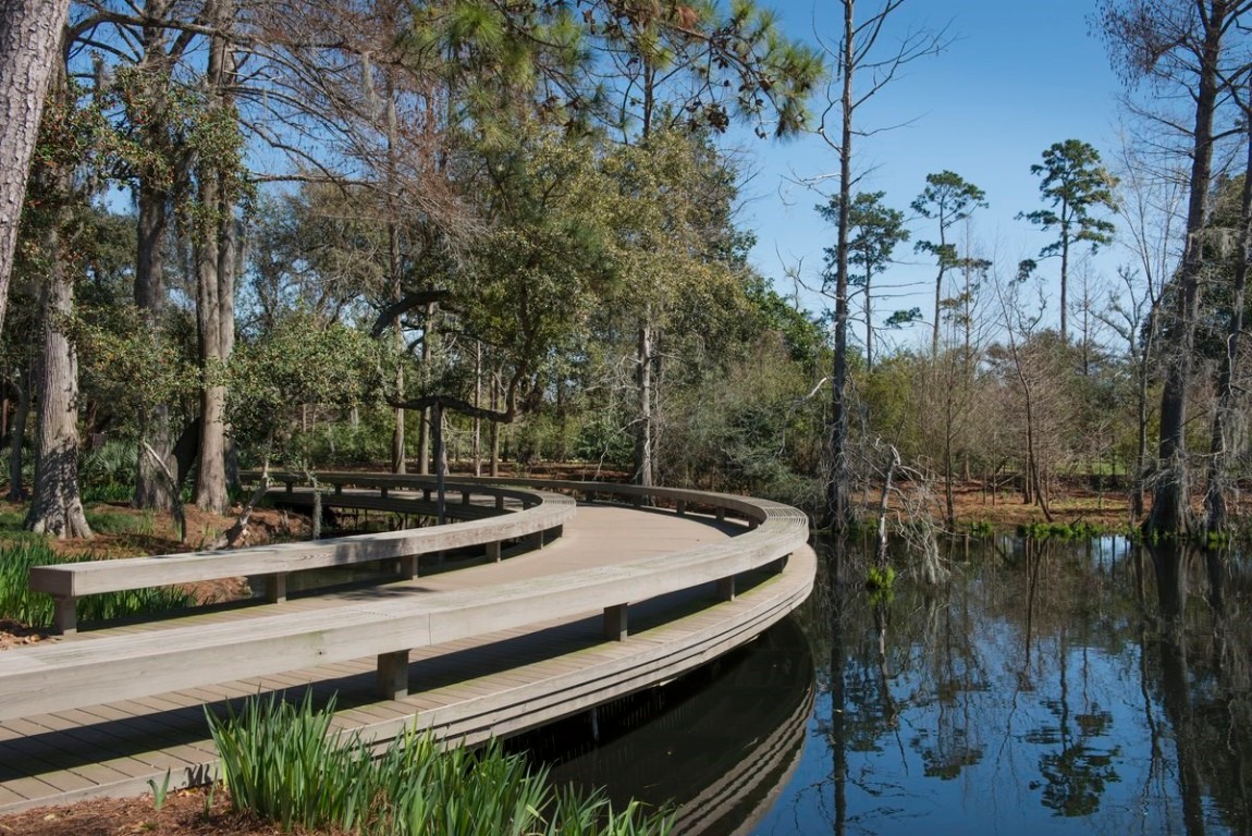 6810 Arbor Way Orange, TX 77630 - Photo 4 of 6 a view of a lake with a house