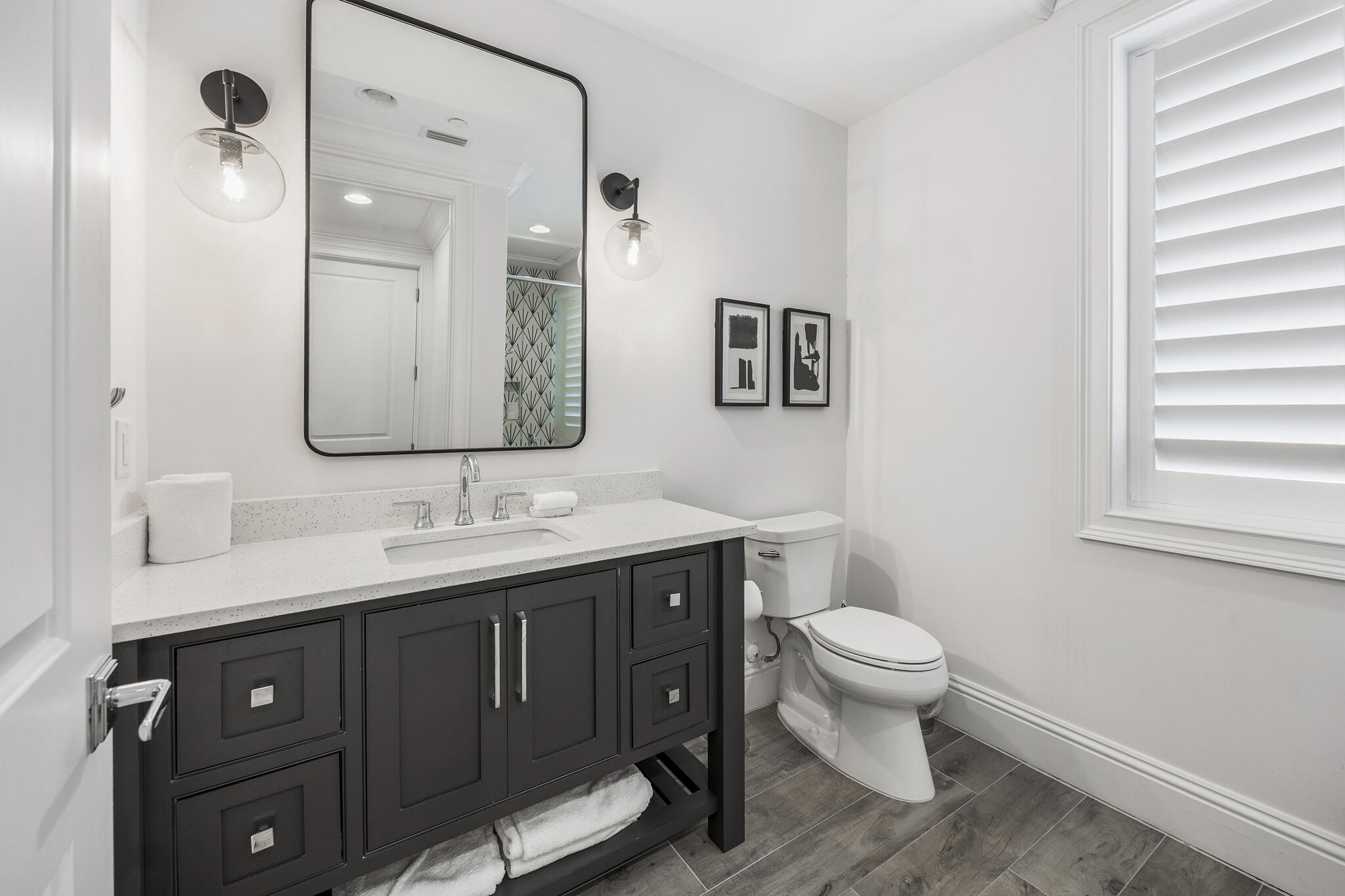 26 Azzurro Way Santa Rosa Beach, FL 32459 - Photo 43 of 78 a bathroom with a toilet sink and mirror